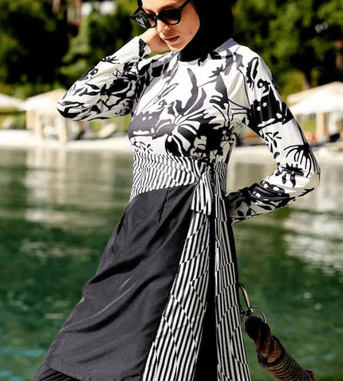 Burkini for veiled women with a black and white striped design