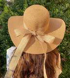 Flared straw hat with scarf from L'Afionsa