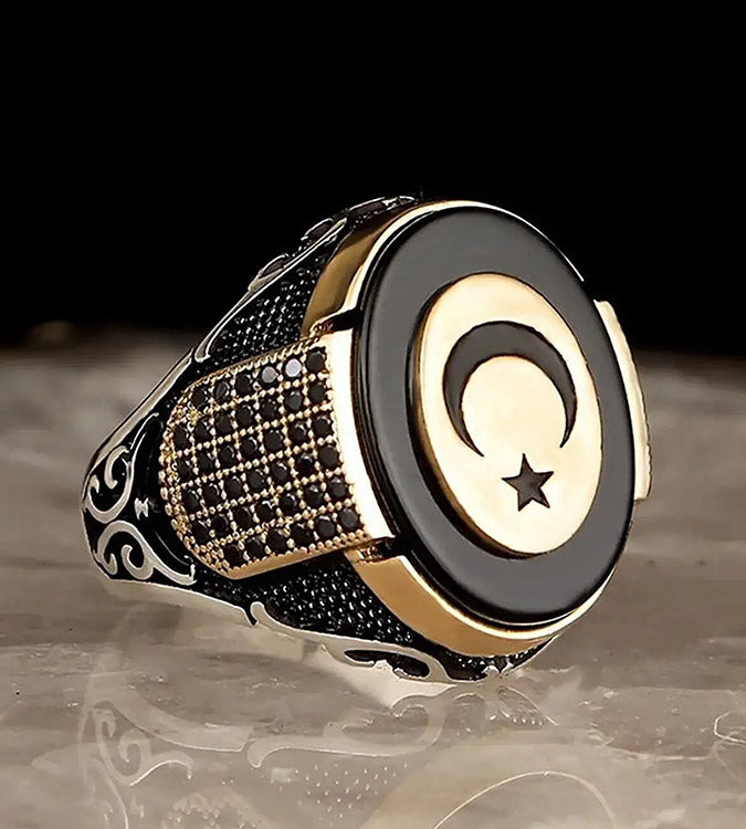 925 sterling silver men's ring studded with an onyx stone with a star and crescent pattern