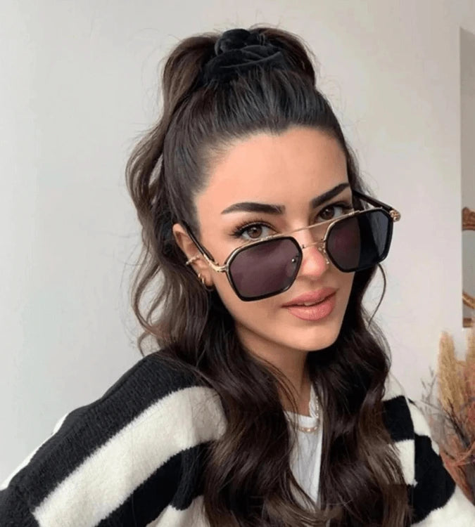نظارة شمسية سوداء بإطار عظم ومعدن